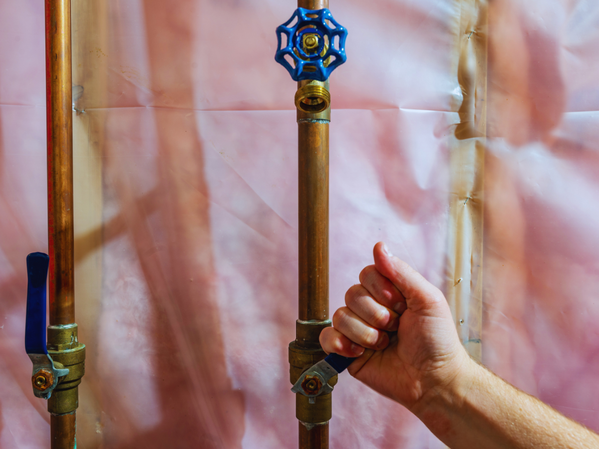 Homeowner shutting off main water shut-off valve