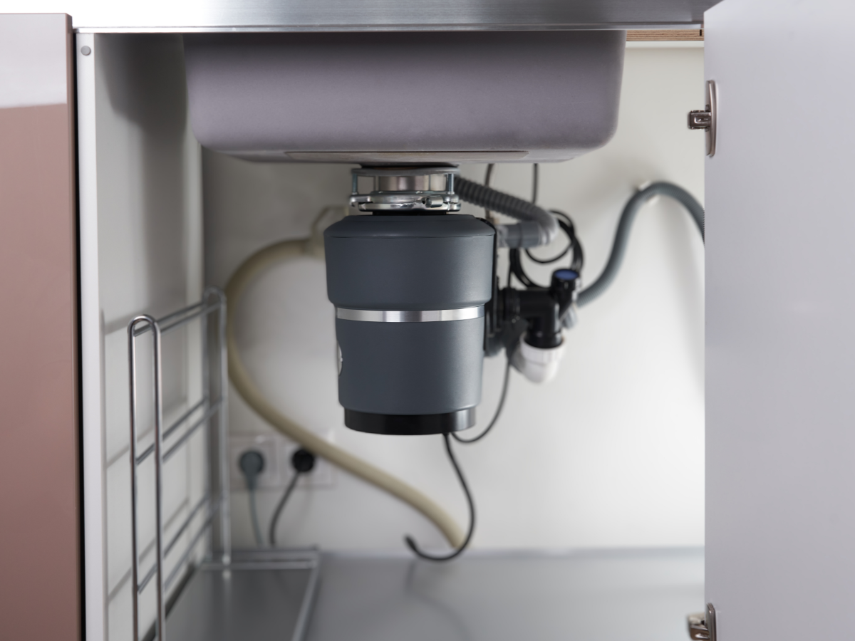 Garbage disposal installed under sink 