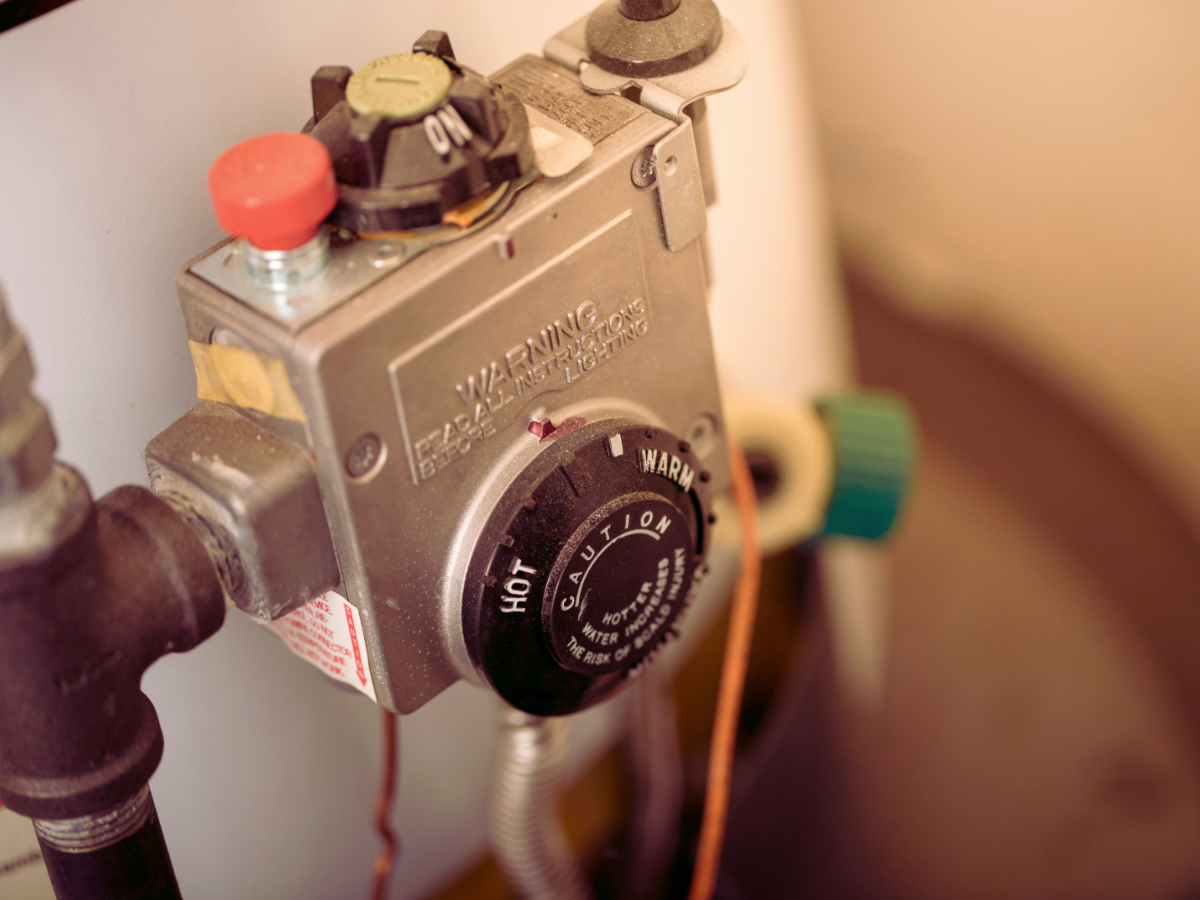 Water heater dial set between warm and hot